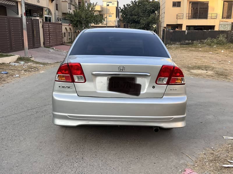 Honda civic vti 2001

                                                            alt=