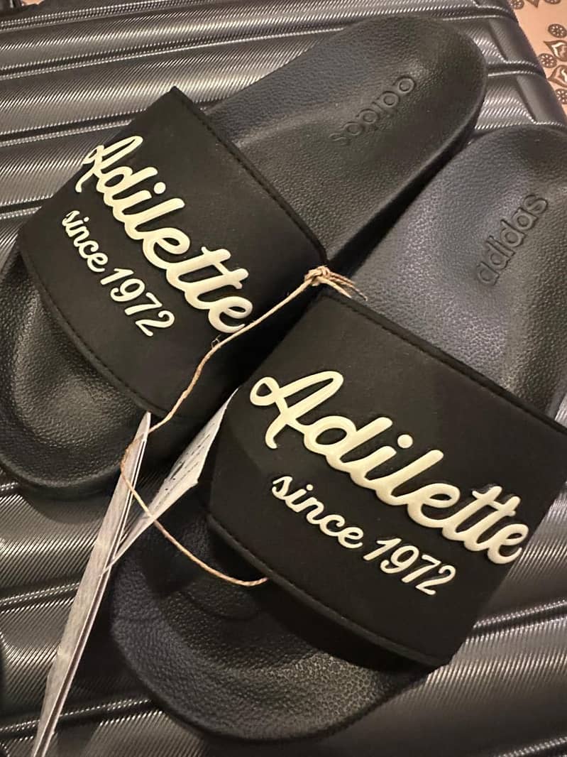 Adidas Adiletie Shower Slides

                                                            alt=