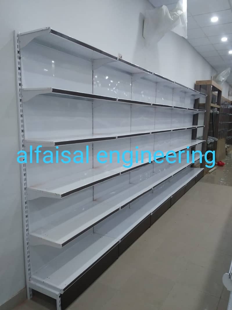 Wall Rack/ Store Rack/ Gondola Rack/ Shopping Trolleys/ Baskets

                                                            alt=