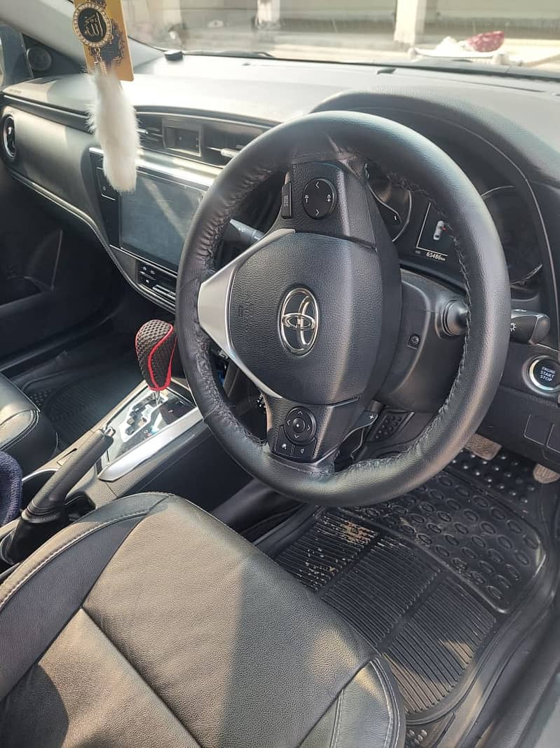 Toyota Corolla Altis Grande X CVT-i 1.8 Black Interior 2022

                                                            alt=