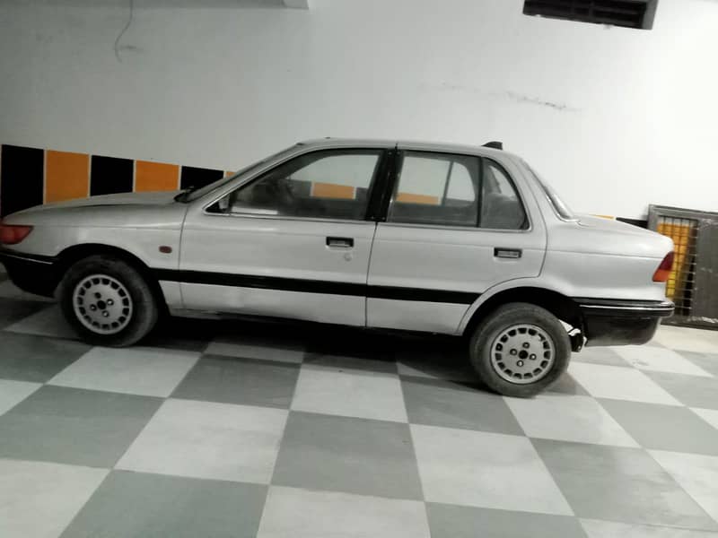 Mitsubishi lancer 1991

                                                            alt=