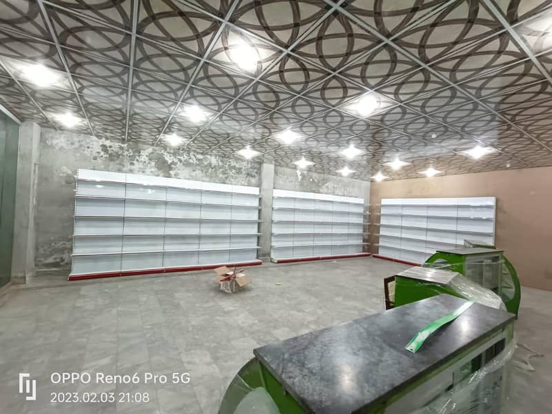 super store racks shelves cash counter available

                                                            alt=