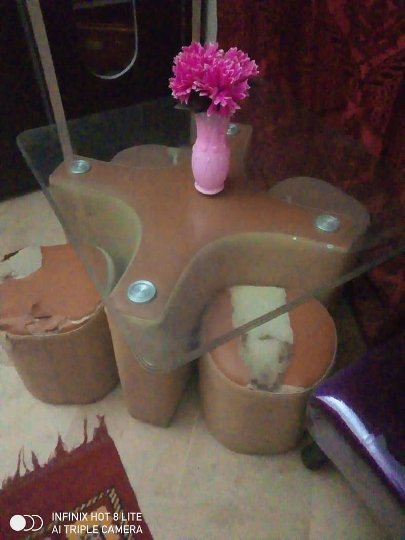 center table with 4 mini stools

                                                            alt=