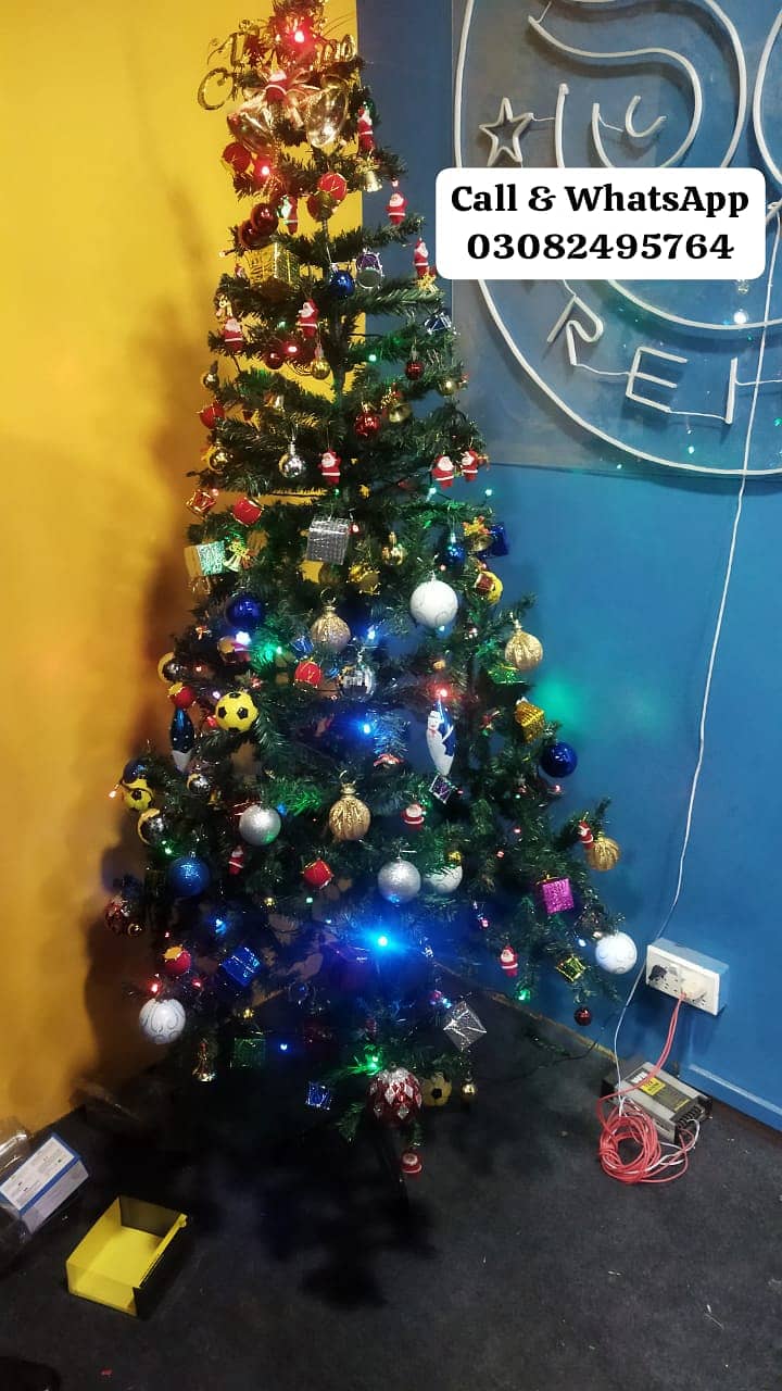 Christmas tree & Decorations 3ft-10ft available contact O3082495764

                                                            alt=