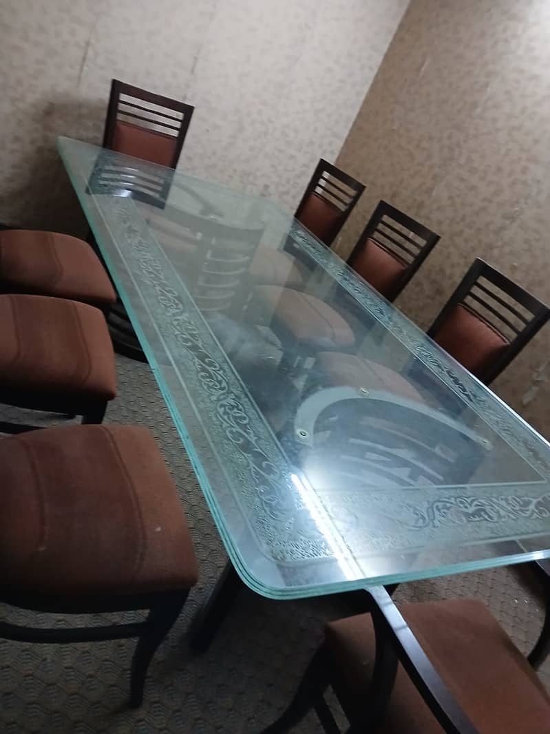 Dining Table with 8 Chairs

                                                            alt=