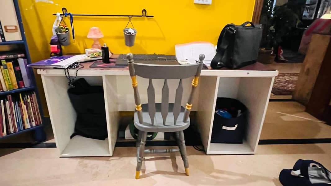 Customer Ikea style study / work table with open storage ideal for DYI

                                                            alt=