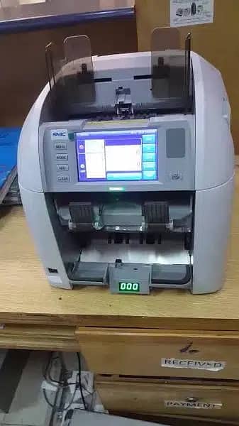 Note counting machine fake/jali detection, cash mix value counting

                                                            alt=