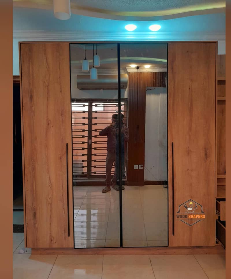 Wardrobe -Media wall -Wall panelling -Wooden Floor -wood work

                                                            alt=