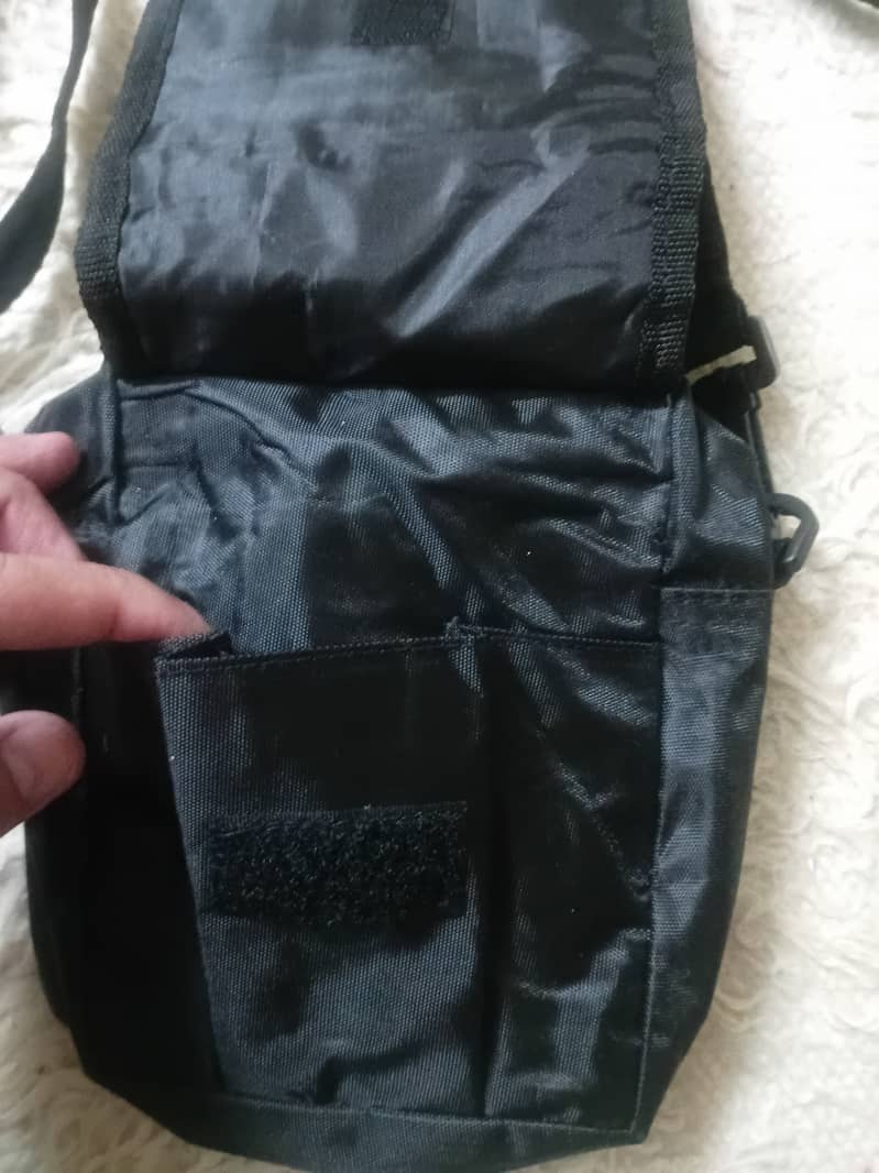 Haj Umra cross body travel bag

                                                            alt=