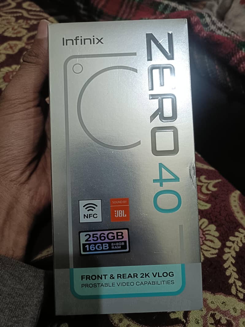 infinix zero 40 4g box packed

                                                            alt=