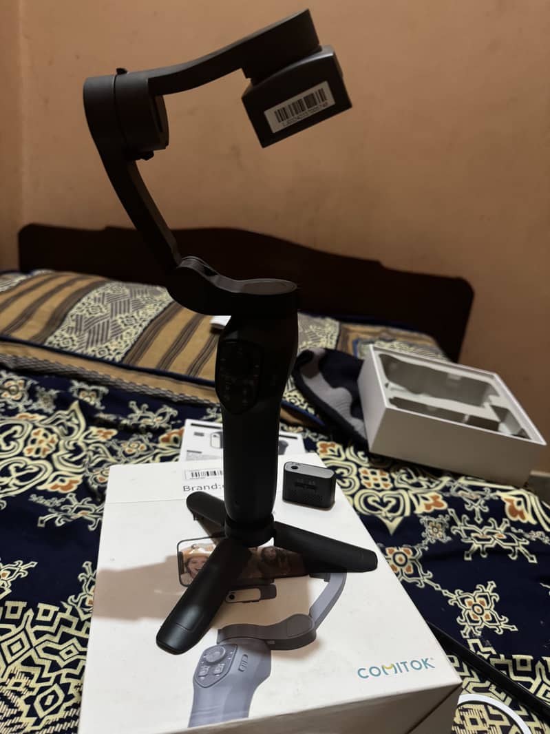 COMITOK Gimbal With AI Tracking

                                                            alt=