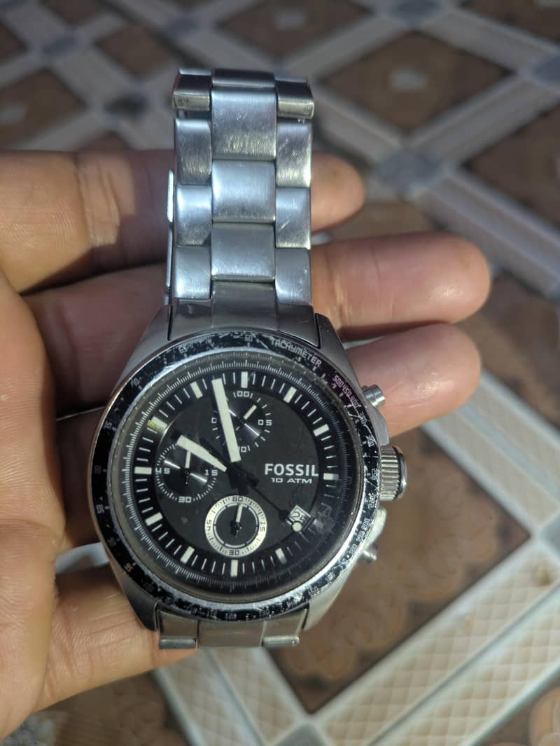 Fossil branded American watch

                                                            alt=