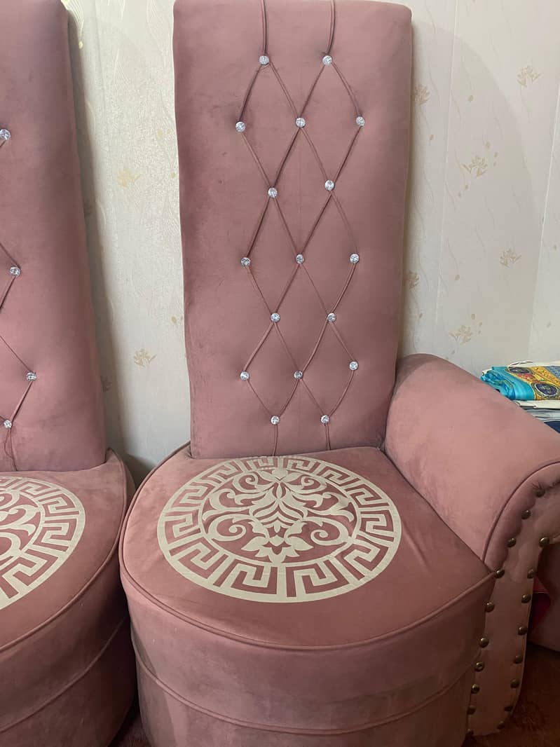 two coffee chairs with a table

                                                            alt=