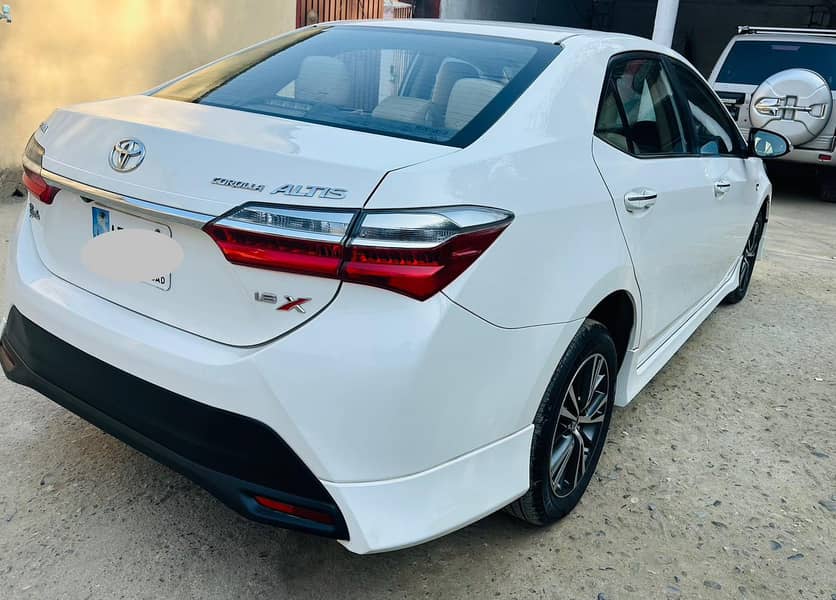 Toyota Corolla Altis Grande X CVT-i 1.8 Beige Interior 2022

                                                            alt=