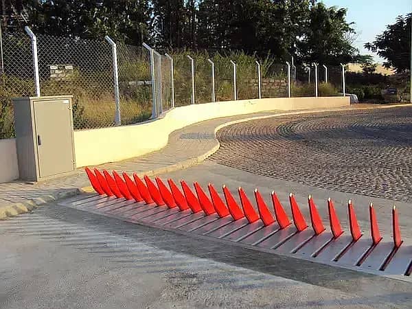 ROAD BLOCKERS AUTOMATIC BOOM BARRIERS TYRE KILLERS (SPIKE BARRIERS)

                                                            alt=