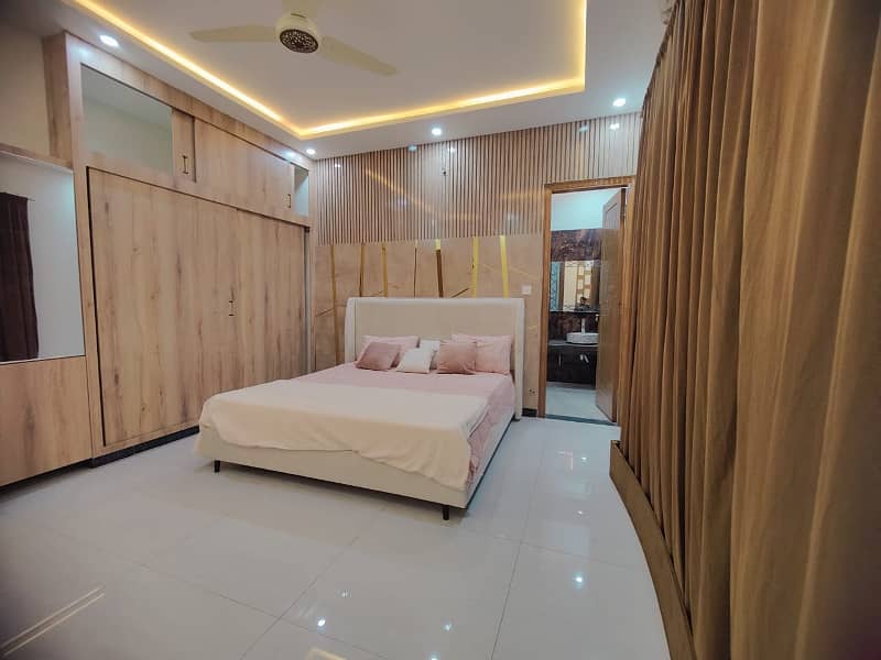 10 Marla Luxurious Furnished House Available For Rent In Bahria Town Phase 4

                                                            alt=