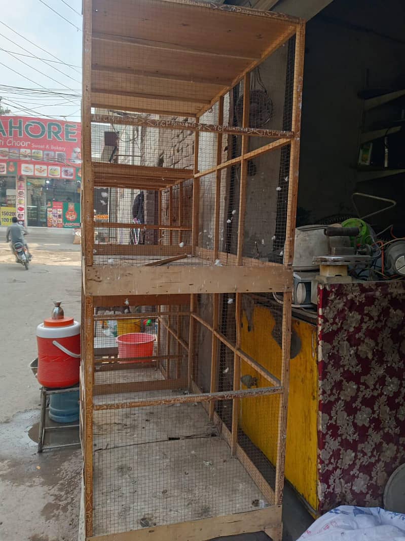 pair of wooden birds cage 6 feet height 4 feet width

                                                            alt=