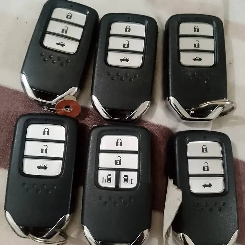 Key maker car keys remote honda Suzuki move Kia grande key programming

                                                            alt=