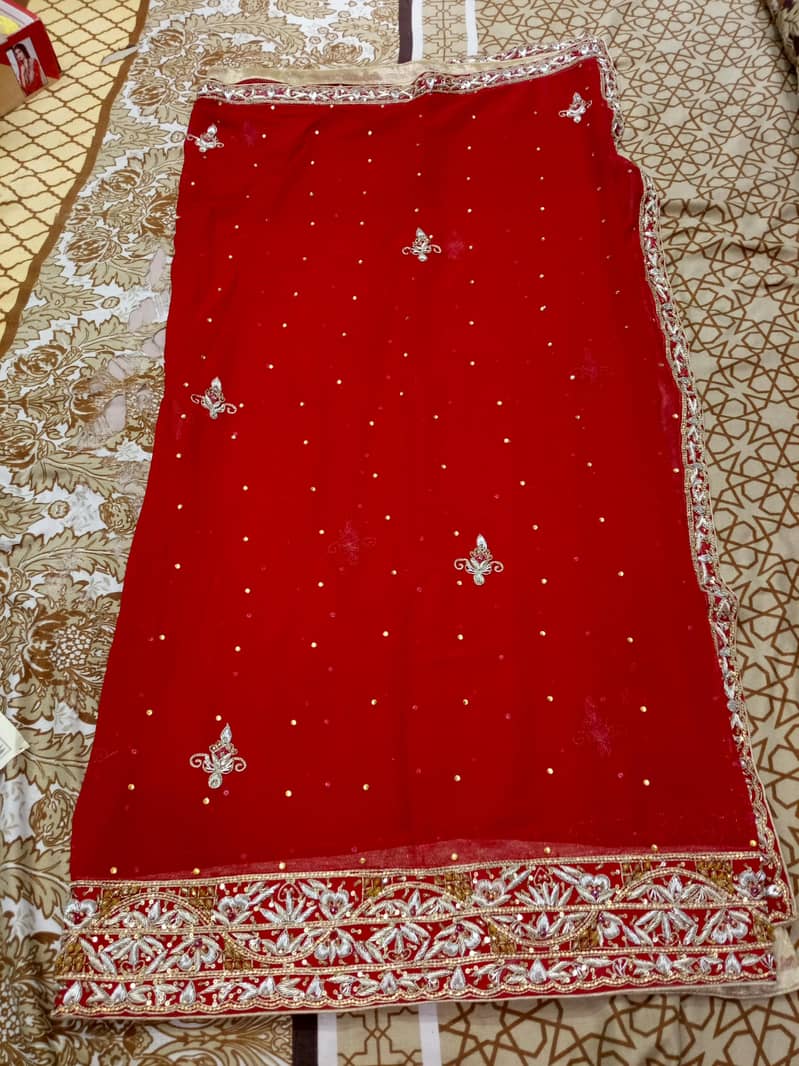 bridal lahnga stich ready to wear  color mahrooon stich

                                                            alt=