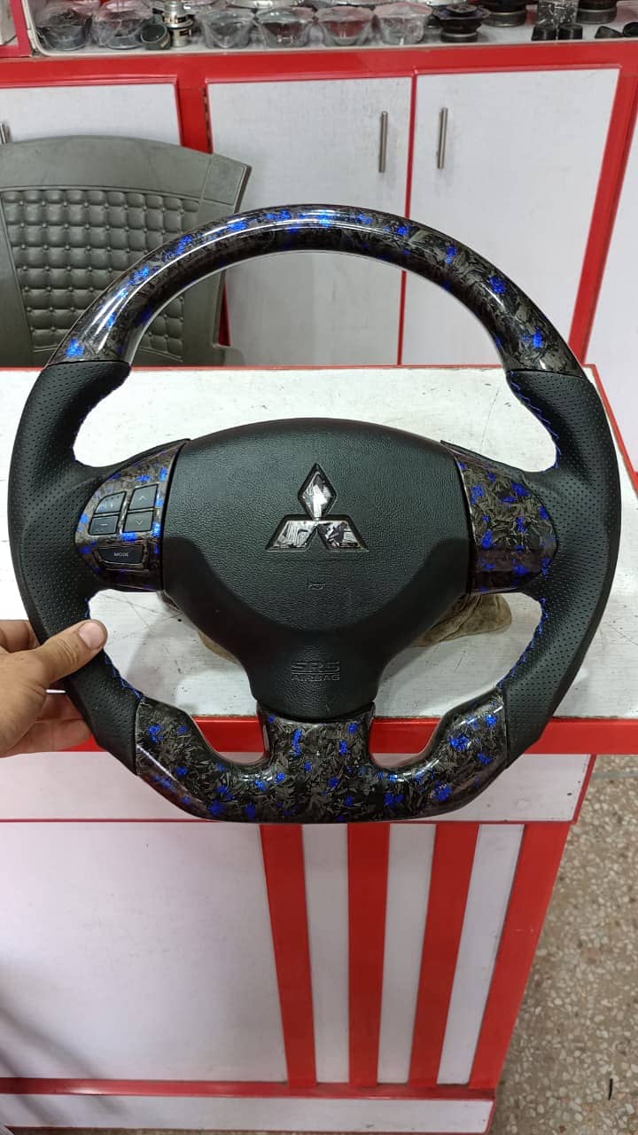 sports steering wheel installation

                                                            alt=