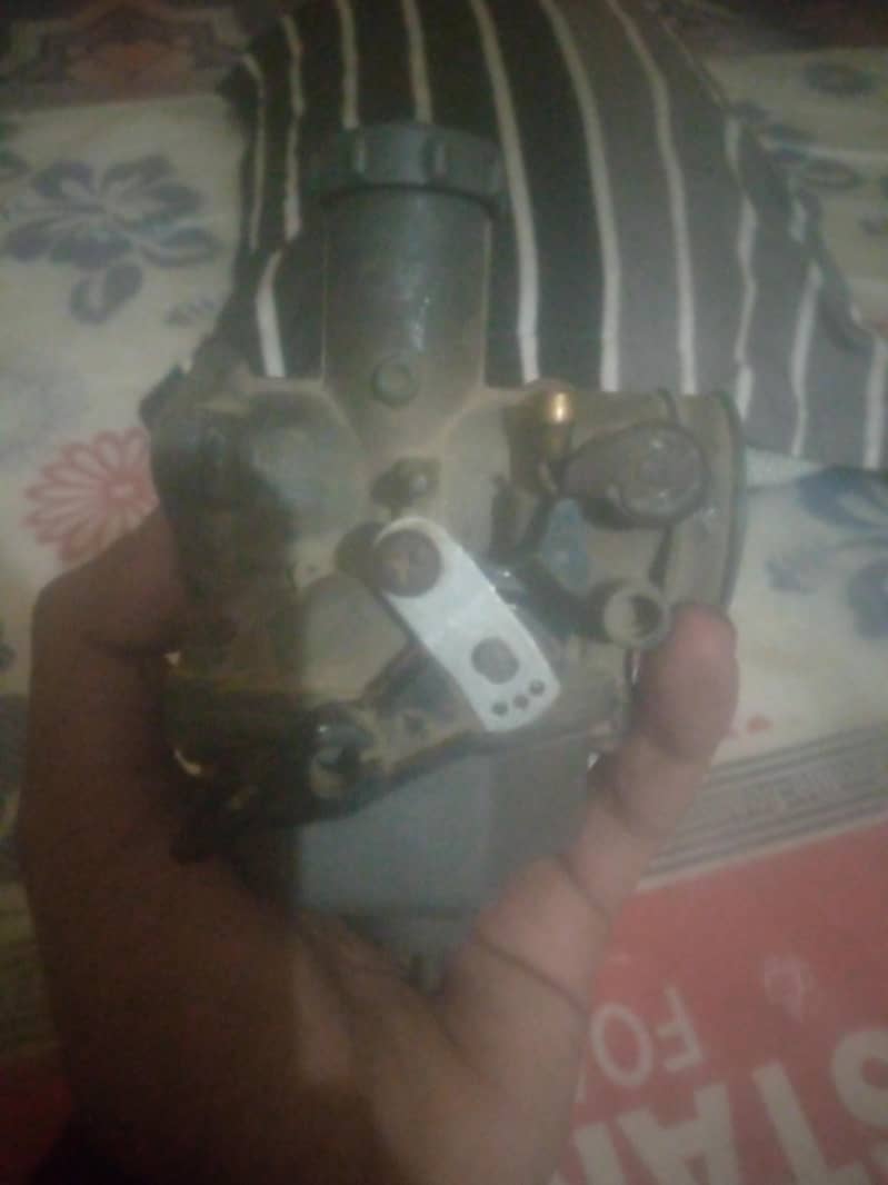 Honda 125 original carburator

                                                            alt=