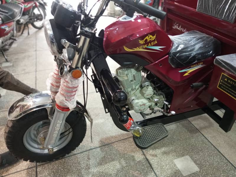 New Asia 150cc regular Loader Rickshaw

                                                            alt=