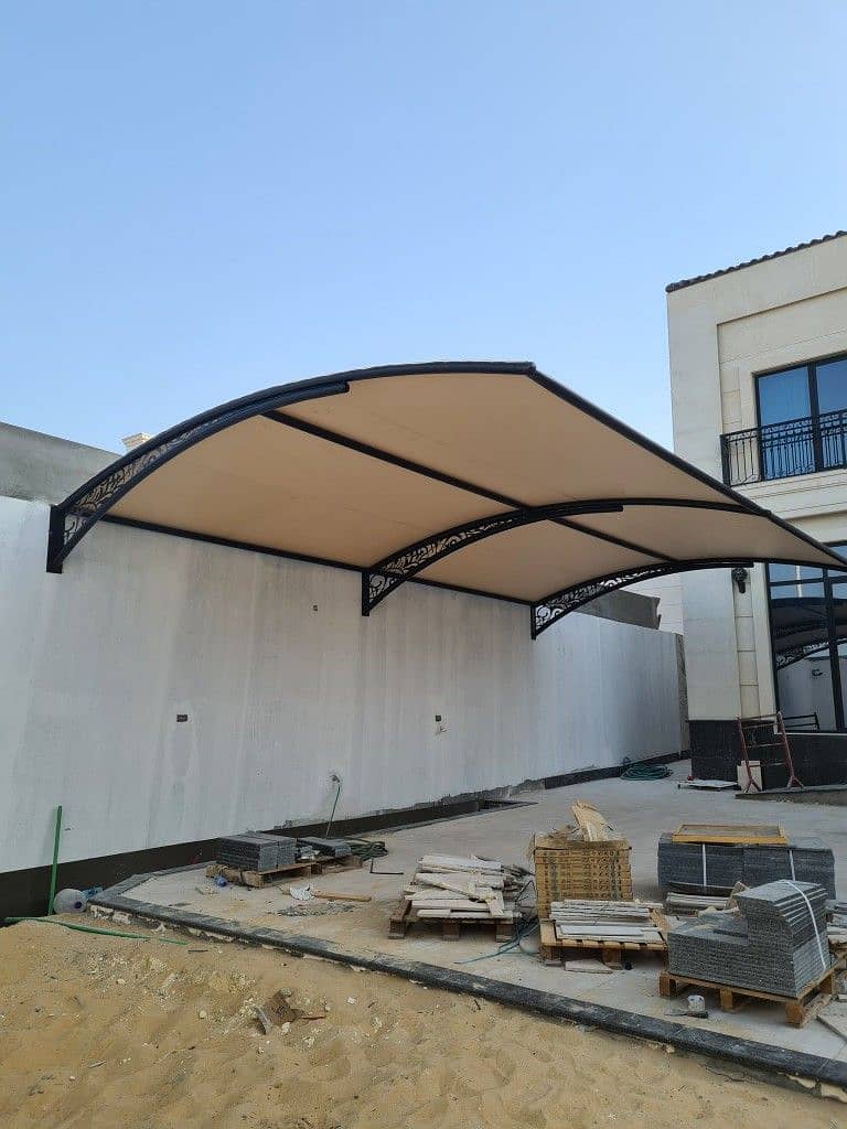 Car parking shades in Pakistan/ Pvc fabric shade/ Rolling shed/ Porch

                                                            alt=