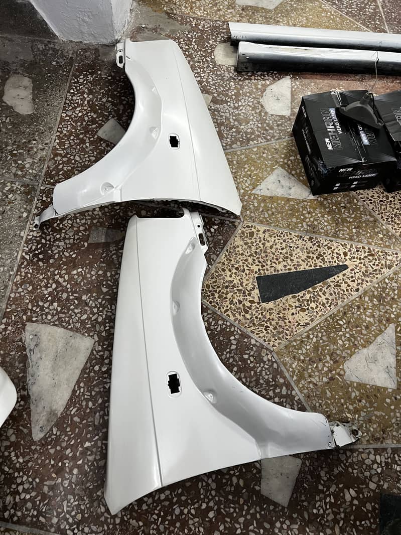 Mehran all body kits with bumpers and spoiler and ring light for sale

                                                            alt=