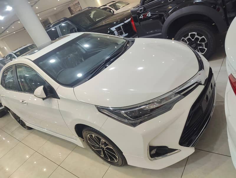 Toyota Corolla Altis Grande white whit Black 2026 model zero meter

                                                            alt=