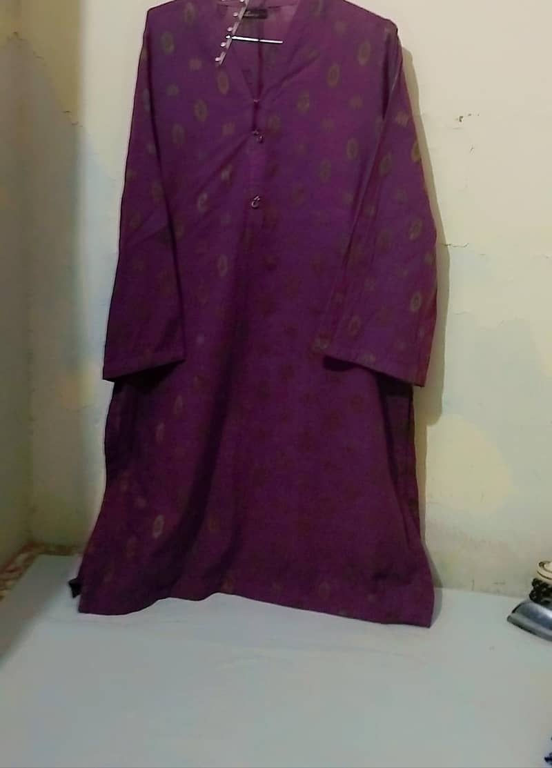 Jacquard branded khaddar with shawl duppata three piece dress for sale

                                                            alt=