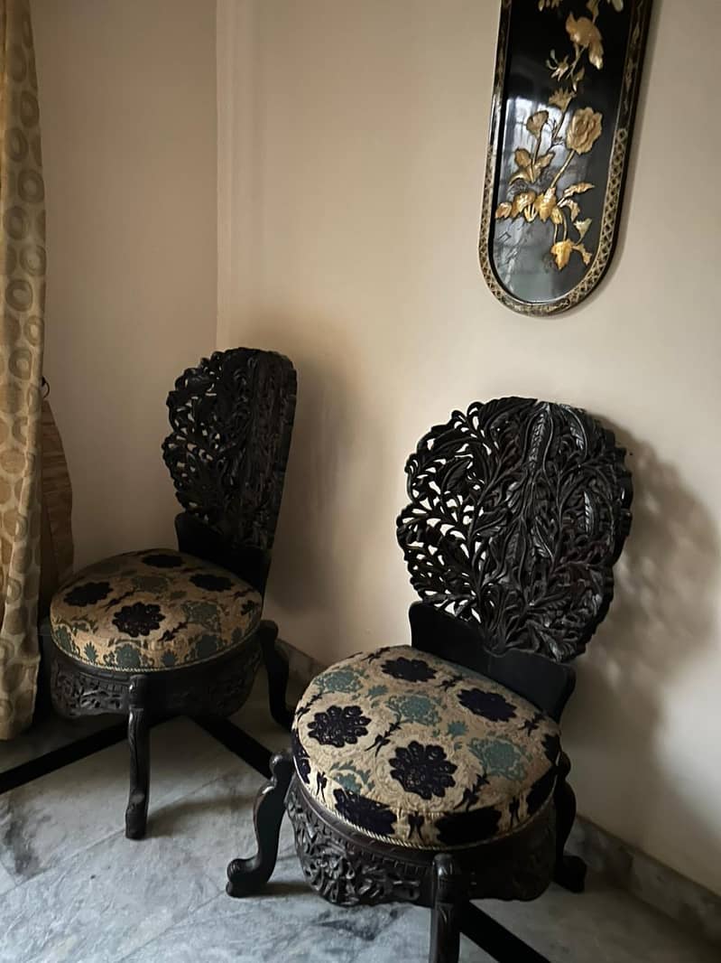 chunati chairs and center table

                                                            alt=