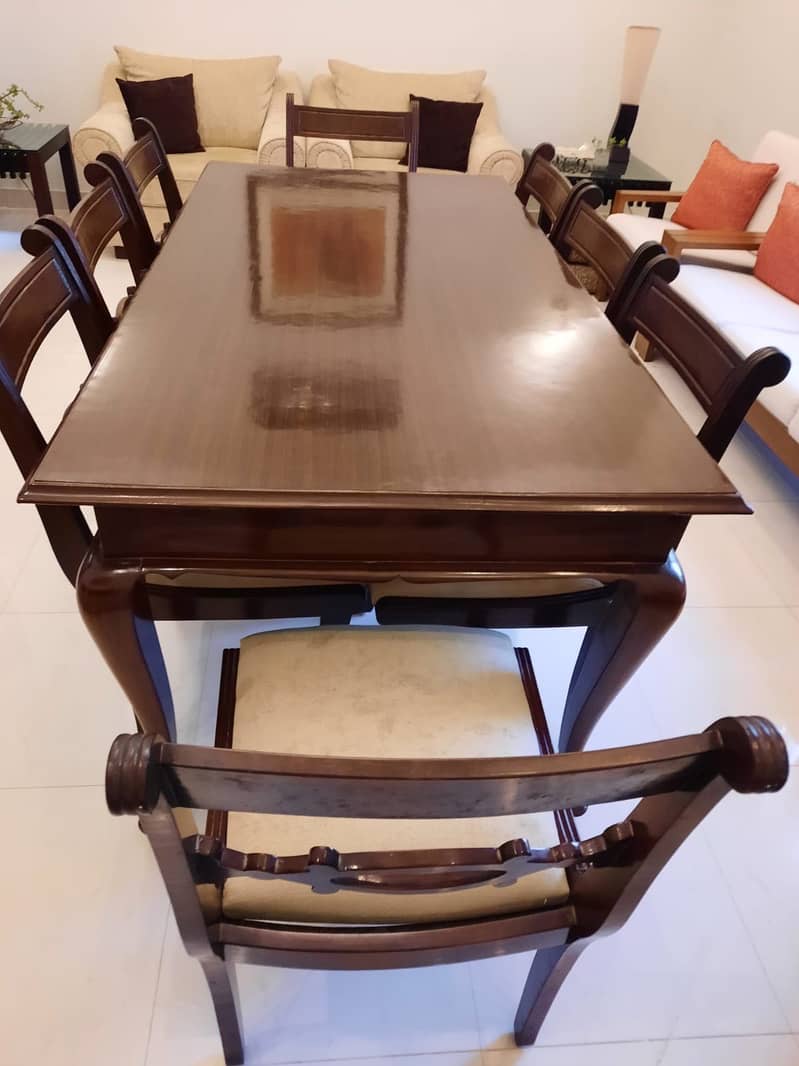 Elegant Sheesham Dining table + 8 seater cushioned chairs

                                                            alt=