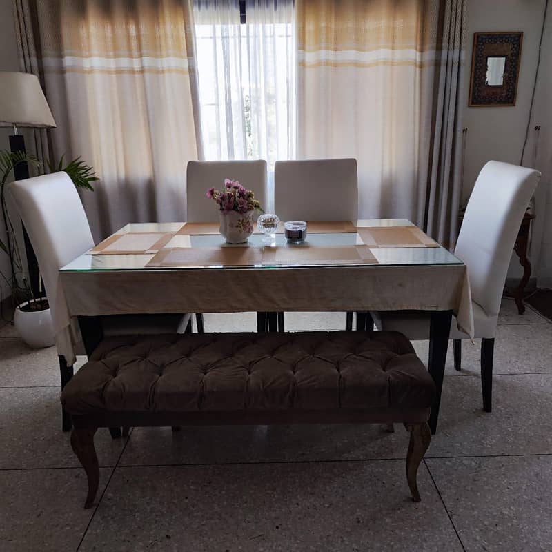 Wooden Dining Table with Glass Top – 6 Chairs Included

                                                            alt=