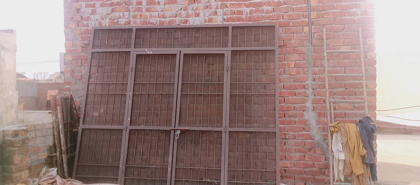 Grill gate . home grill grill door

                                                            alt=