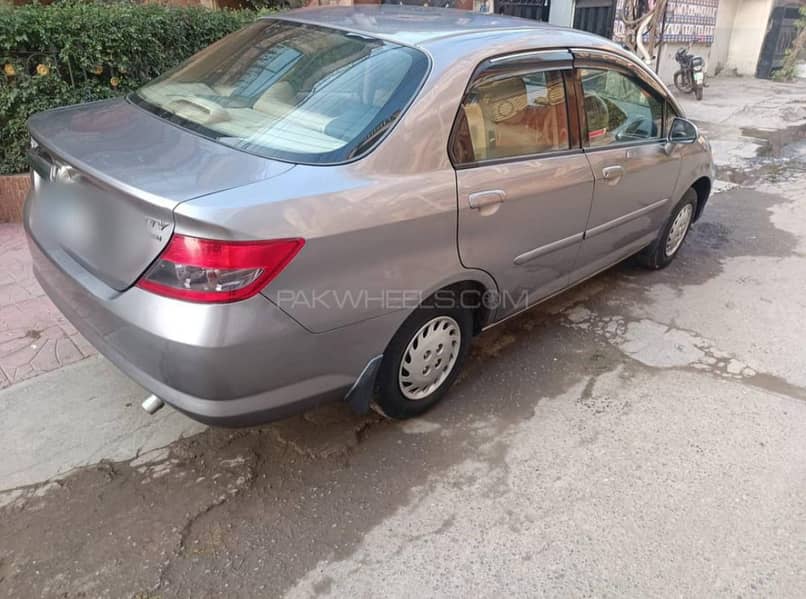 Honda City 2004

                                                            alt=