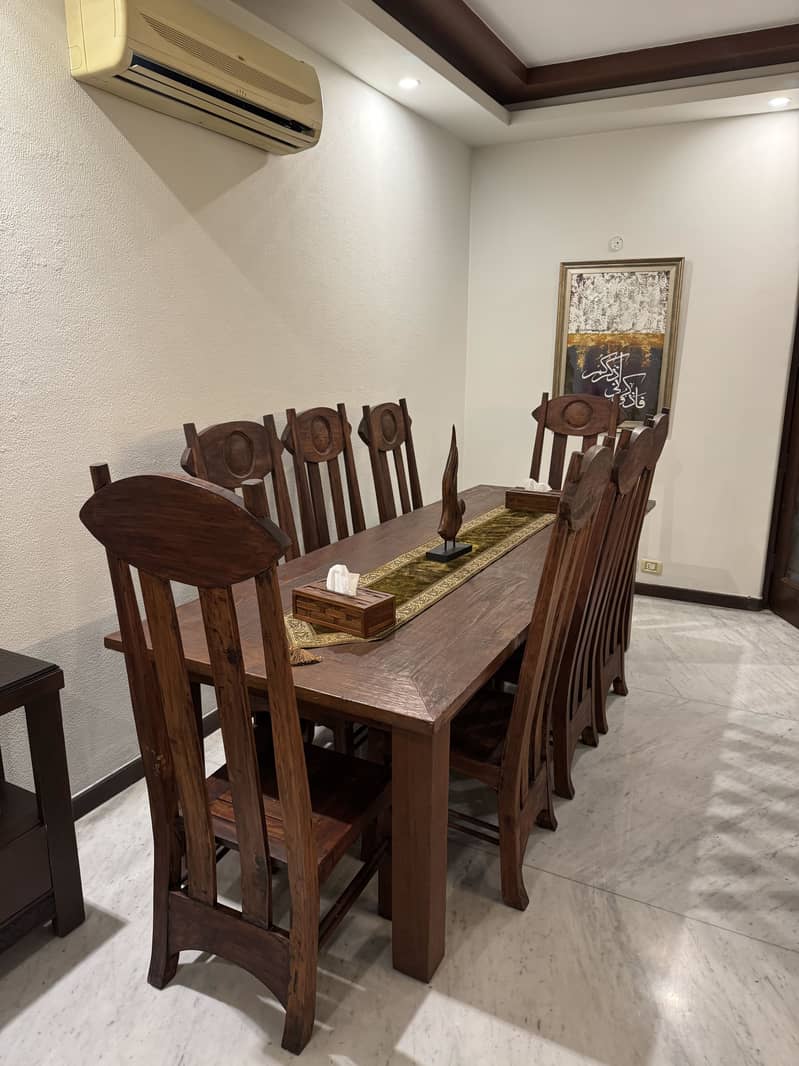 Premium wooden family dinning table with 8 chairs

                                                            alt=