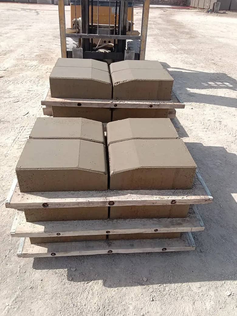 Tuff Tile Machine  , Concrete Paver , Block Making Machine

                                                            alt=