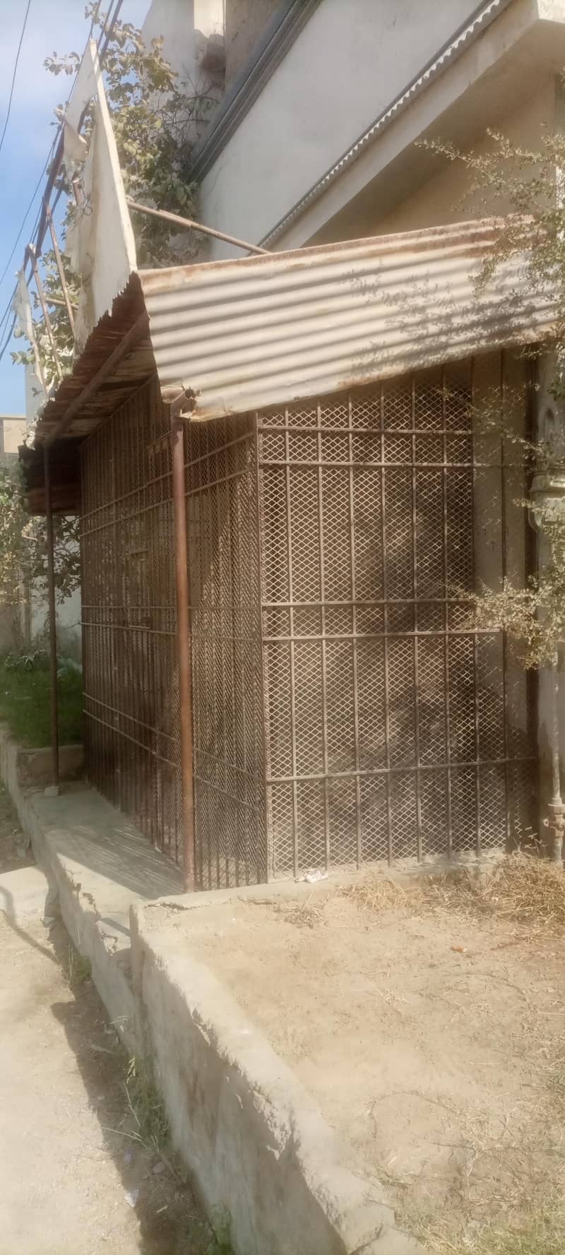 rack, iron grill, iron double door, shelves

                                                            alt=