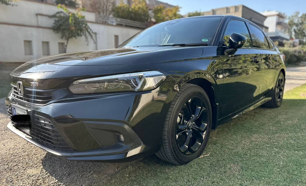 Honda Civic RS 2024

                                                            alt=