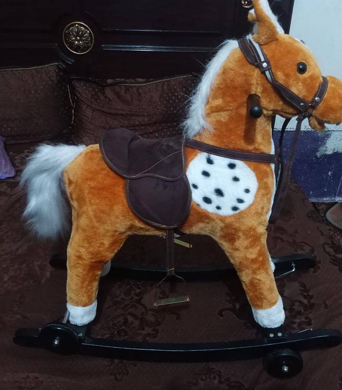 Kids Rocking horse 

                                                            alt=