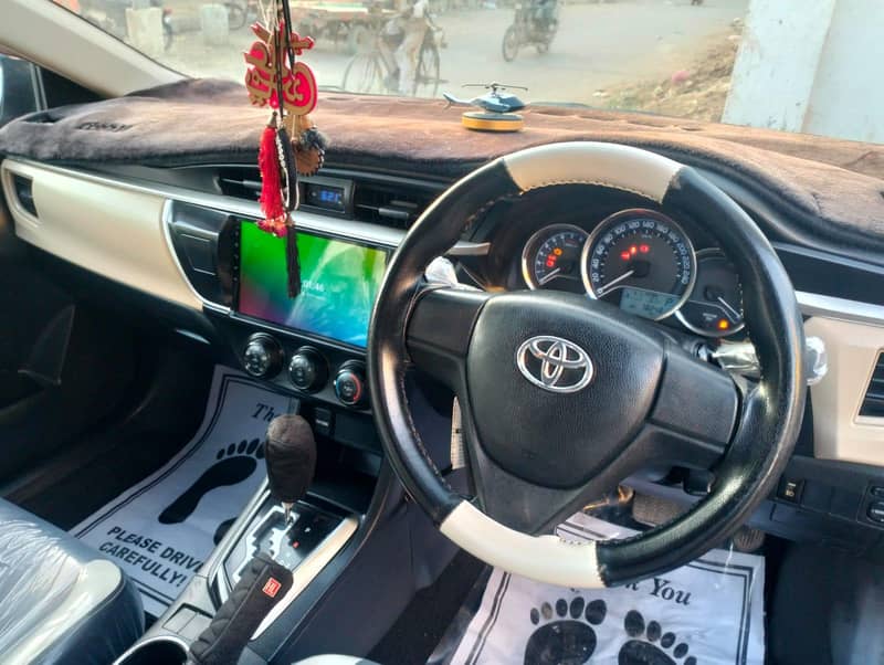 Toyota Corolla Altis 1.6 Automatic – 2015 (Black Beauty!)

                                                            alt=