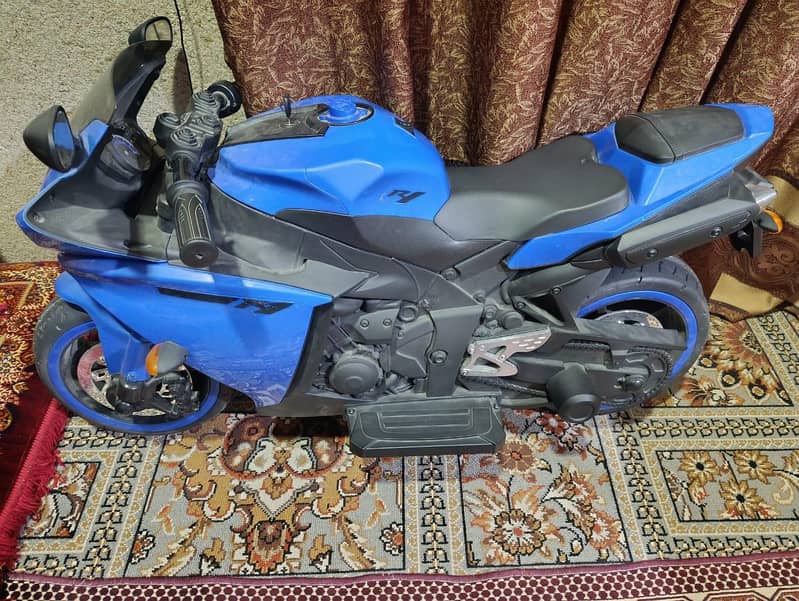 R1 Kids Electric bike

                                                            alt=