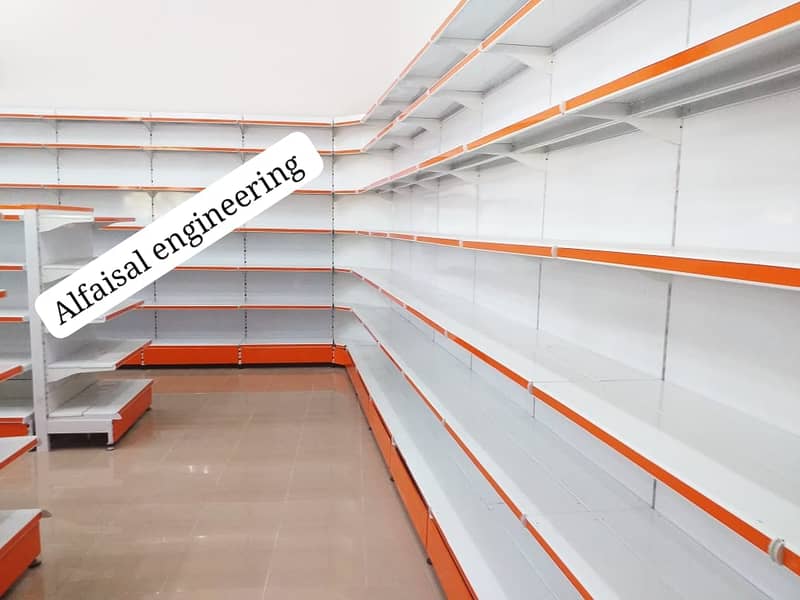 Wall Rack/ Store Rack/ Gondola Rack/ Shopping Trolleys/ Baskets

                                                            alt=