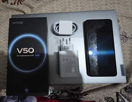 Vivo V50

                                                            alt=