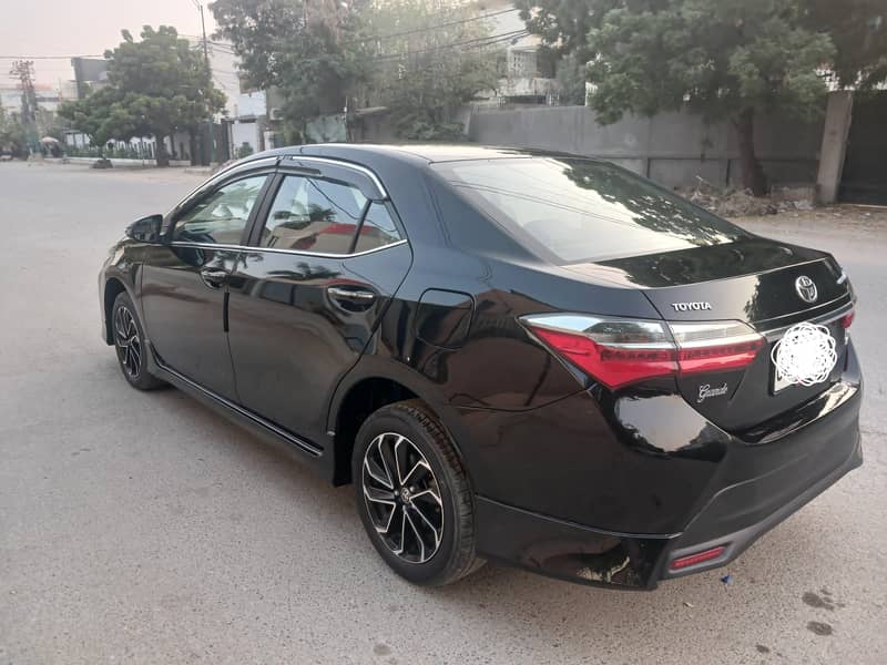 Toyota Corolla Altis X Grande 2024  Black Interior  Attitude Black

                                                            alt=