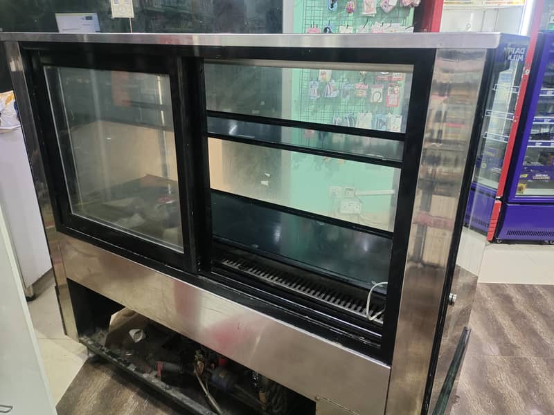 3 Bakery Chillers, Hotplate, Grill, Table, Frayer, & Other Equipments

                                                            alt=