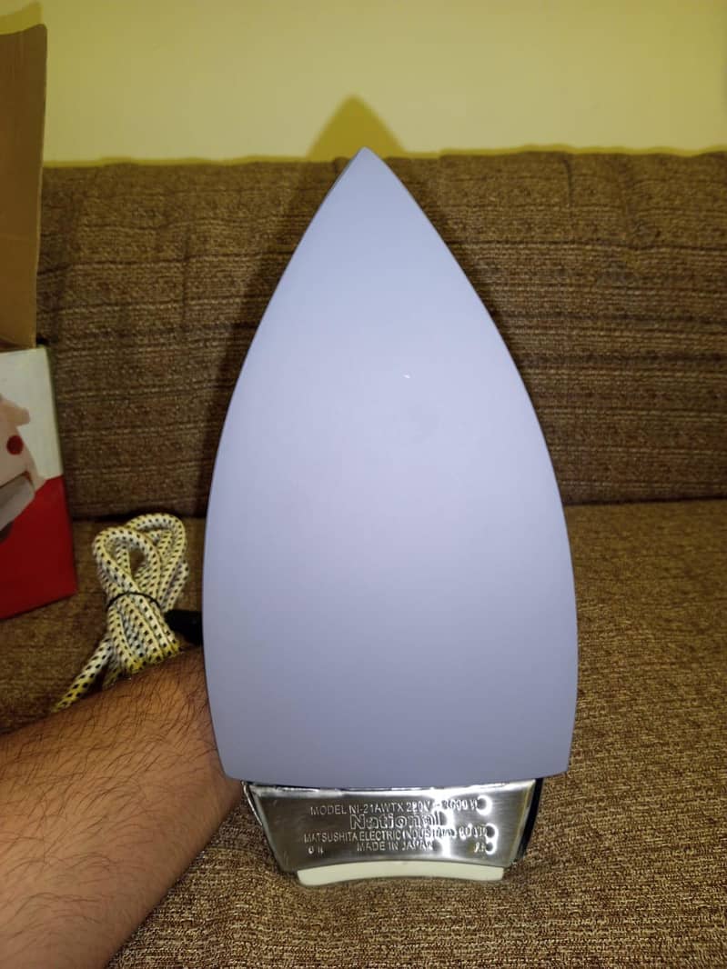 ELECTRIC lRON deluxe NI-21AWT  1000W

                                                            alt=