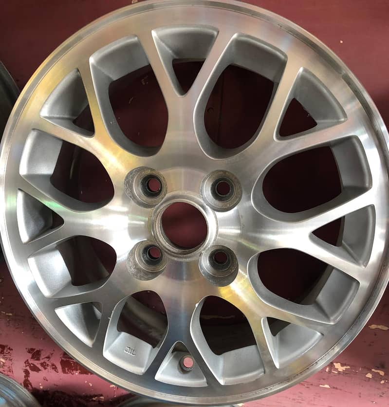 Original OEM Alloy Rims – Mitsubishi Lancer 2004

                                                            alt=