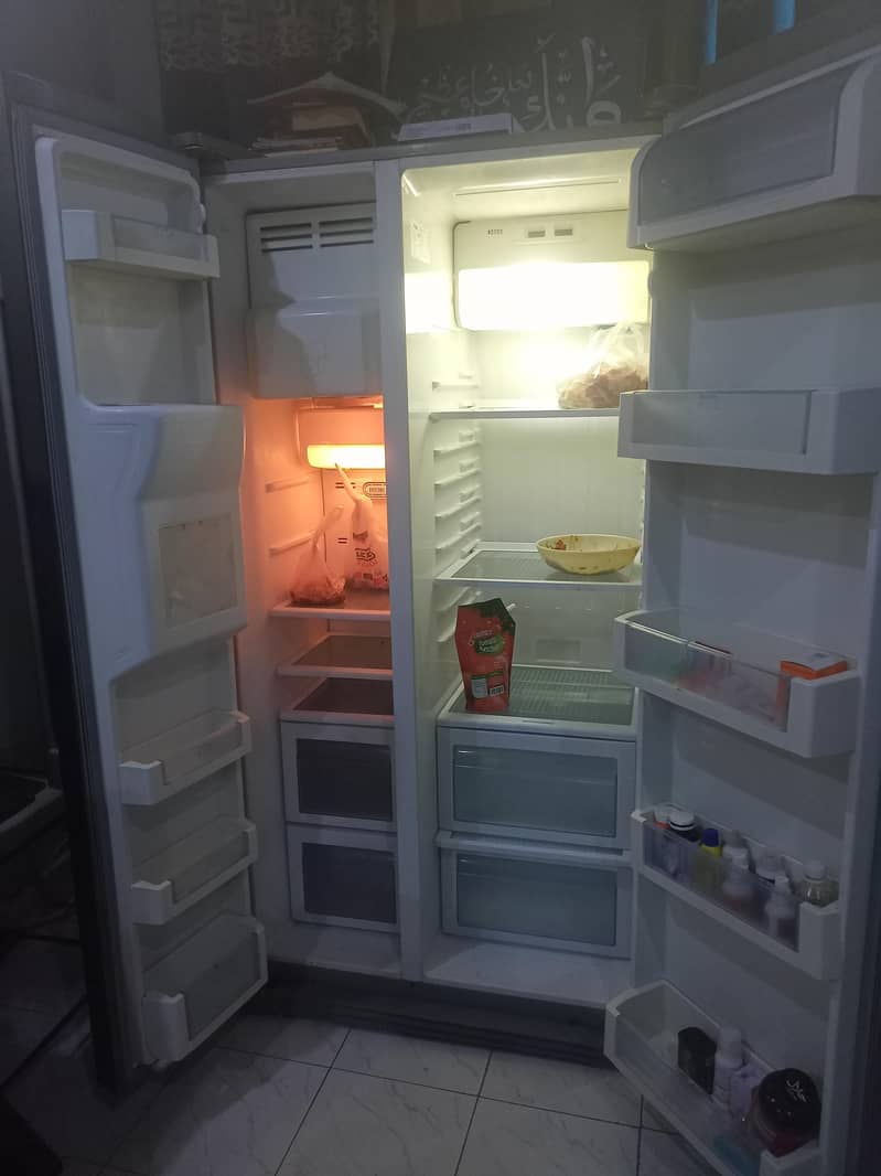 Haier double door fridge

                                                            alt=