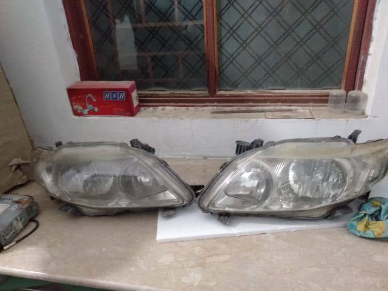 Corolla Gli 2009 model head light

                                                            alt=